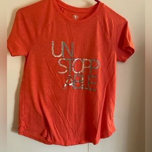 Orange short sleeve shirt girls size large “10/12”